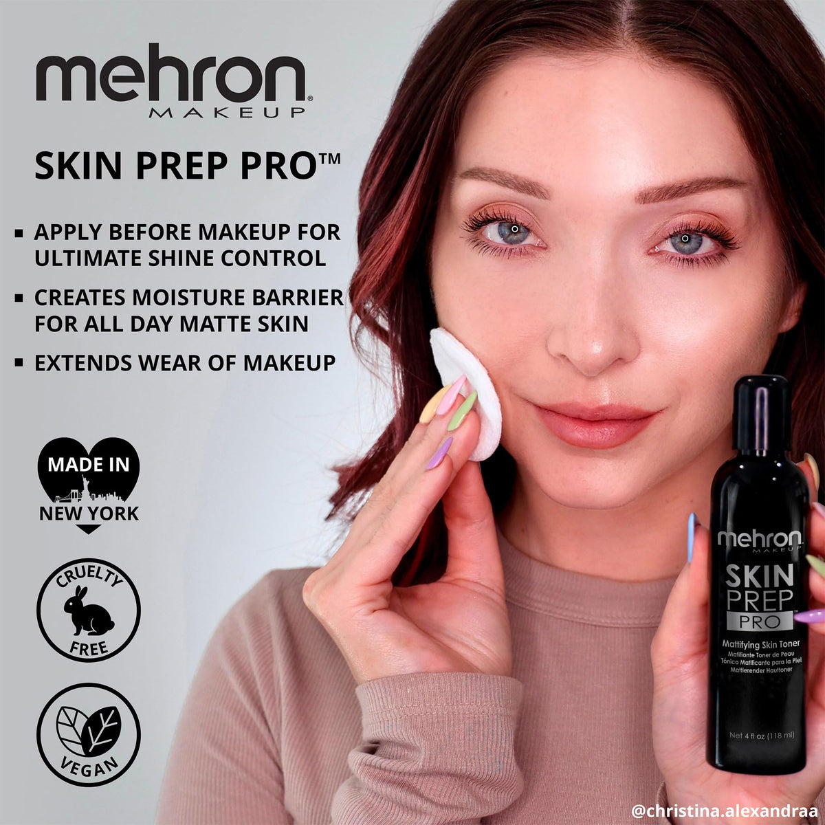 Mehron bottle held in hand to show 4 fl oz scale and travel-friendly benefit