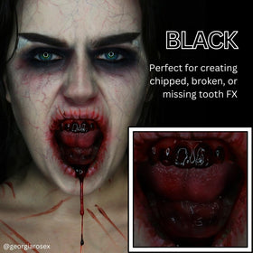 Mehron Tooth FX Black painted tooth close-up demonstrating realistic decay effect