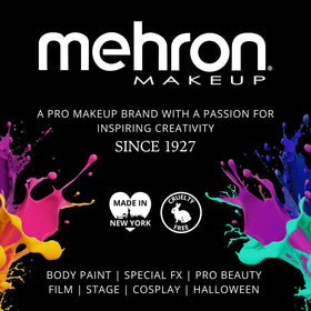 Mehron Tooth FX Black held in hand to show .125 oz size and portable convenience
