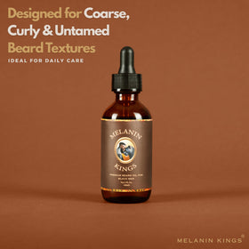 Melanin Kings applying oil to beard demonstrating easy application and styling benefit