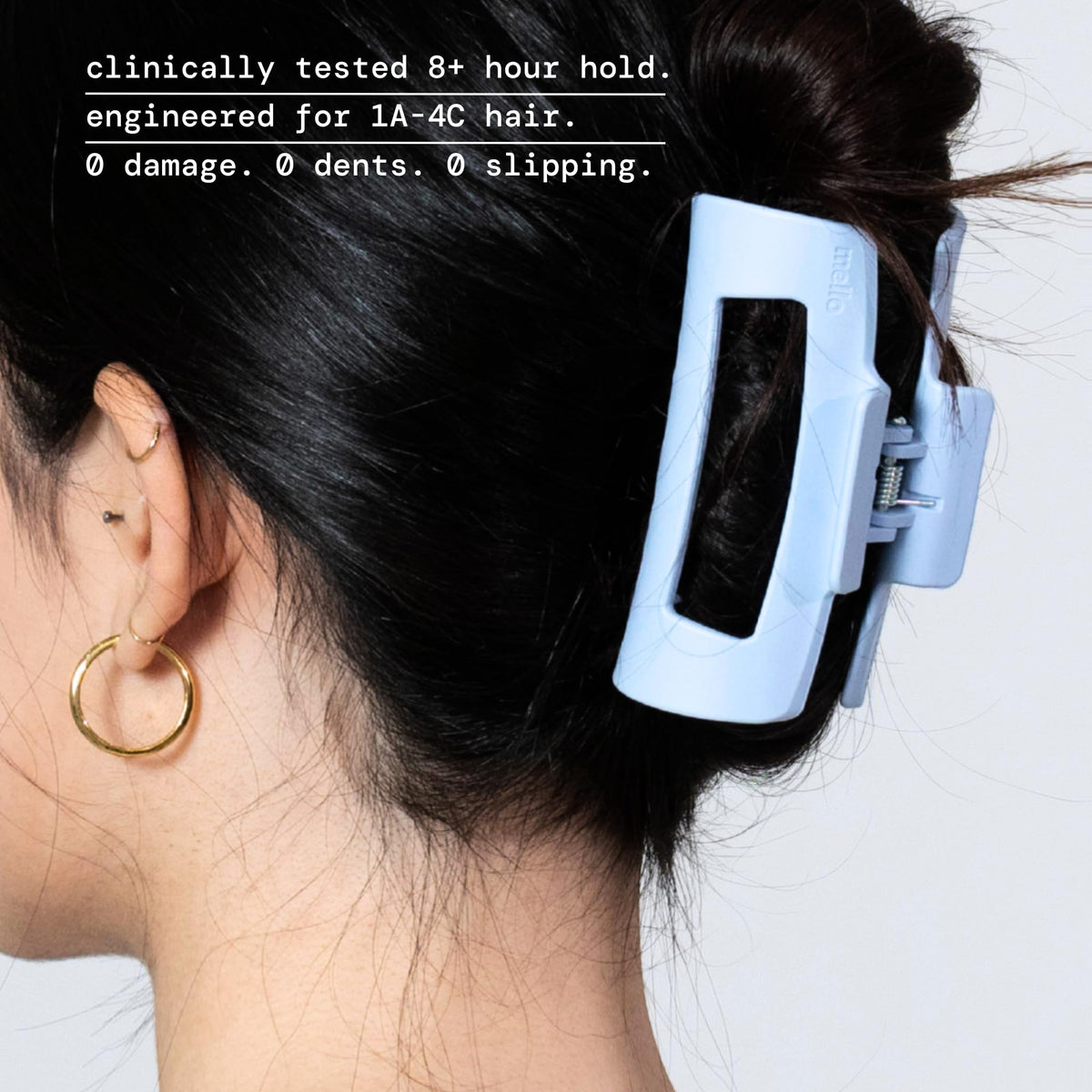 MELLO teeth detail image showing inward-curving teeth for reduced scalp pressure