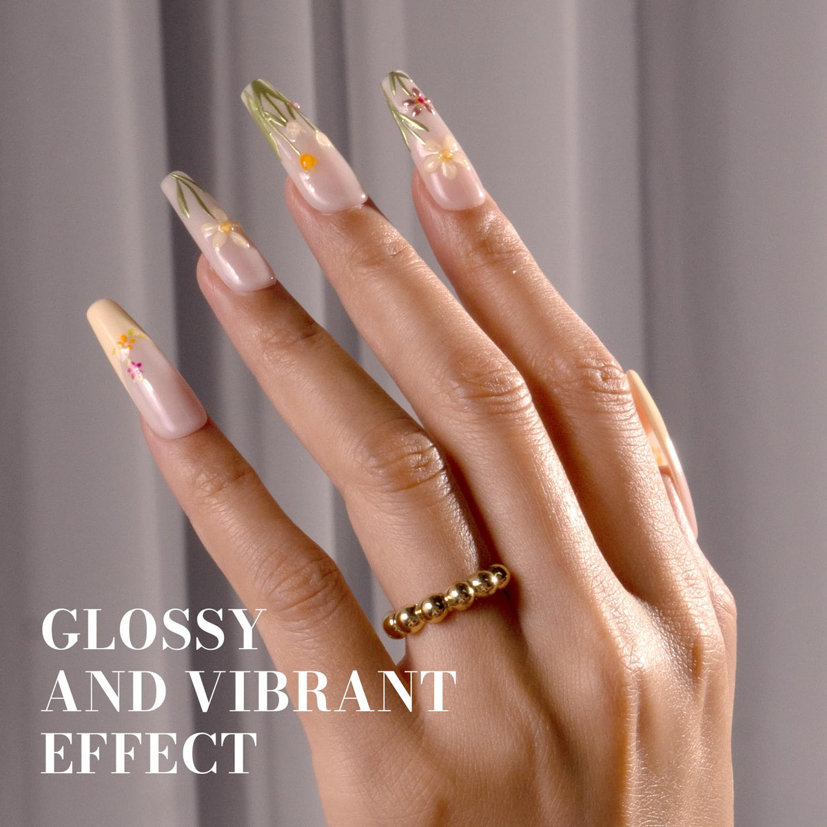 MelodySusie manicure on hand lifestyle shot showing elegant pastel nails
