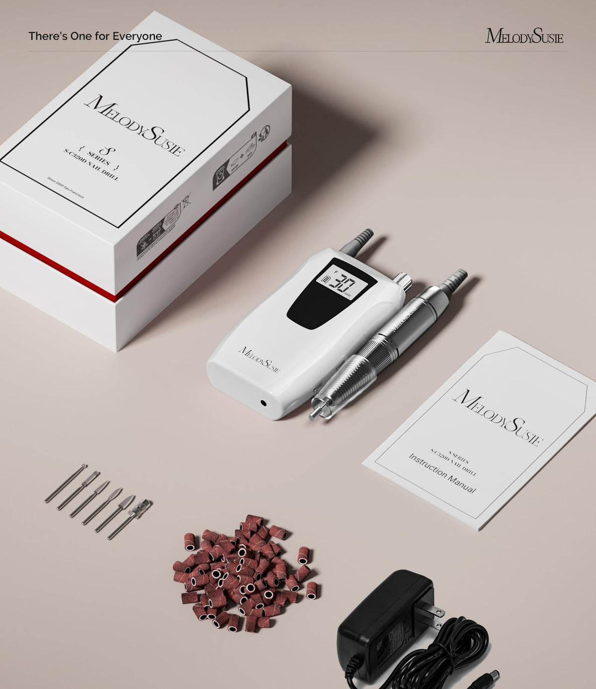 MelodySusie SC320D next to a hand to show scale and ergonomic pen-sized design
