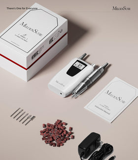 MelodySusie SC320D next to a hand to show scale and ergonomic pen-sized design