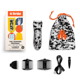 MERIDIAN trimmer next to smartphone showing compact size and convenience