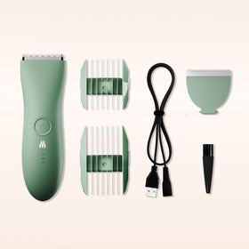 MERIDIAN trimmer tucked in travel kit showing USB charging and travel-ready benefit