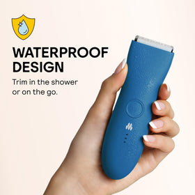 MERIDIAN trimmer in hand to show size and portability for travel and gym use