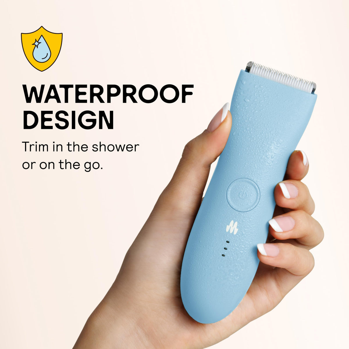 MERIDIAN trimmer next to smartphone for scale showing portable size for travel