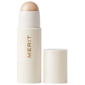 Merit Day Glow balm front packaging showing clean design and portable use