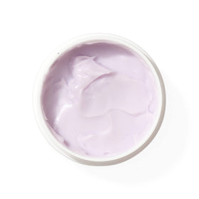 Merlot moisturizer being applied to fingers demonstrating lightweight, non-greasy feel
