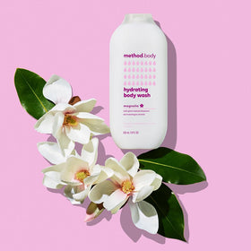 Method magnolia in-shower use with loofah demonstrating gentle cleansing benefit