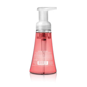 Method pump dispensing pink grapefruit foam close-up demonstrating creamy texture and easy spread