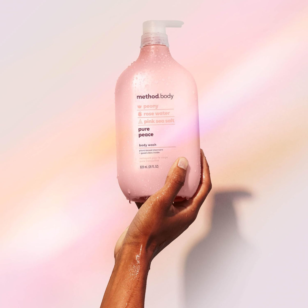 Method 28 oz bottle next to everyday items for clear size reference benefit
