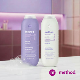 Method Serene Escape on a shower shelf with magnolia scent notes for a calming routine