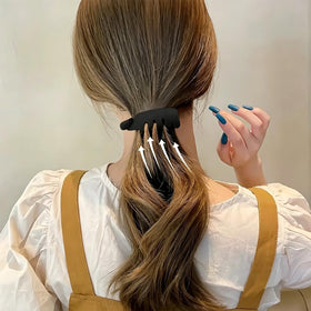 MEZYKAP used to create a lifted high ponytail for instant volume and style