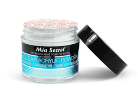 Mia Secret powder being applied on a nail sculpting brush for durable extensions