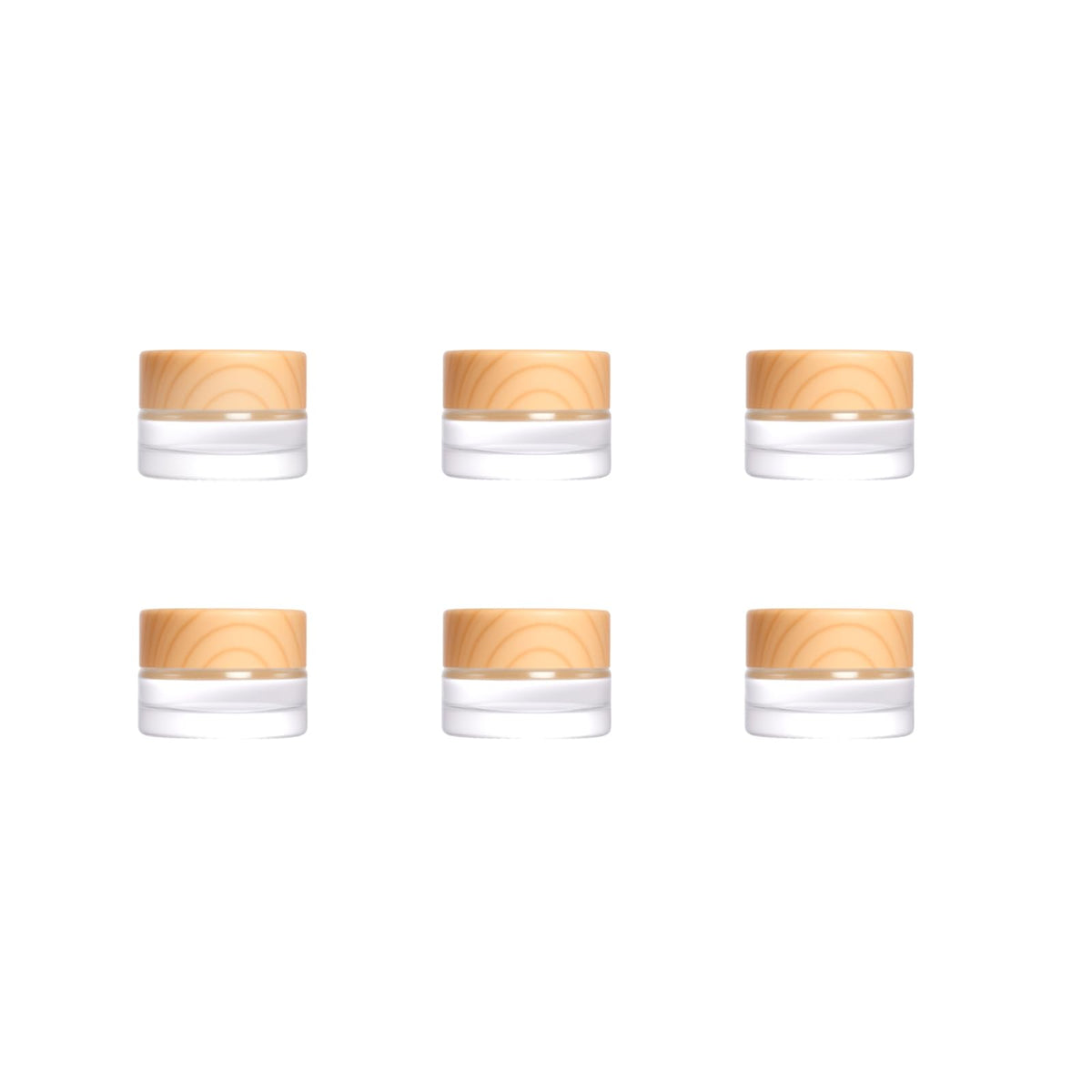 Miayon front view of six small glass jars showing compact travel packing benefit