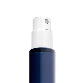 Michael Malul amberwood detail highlighting warm base notes for lasting depth