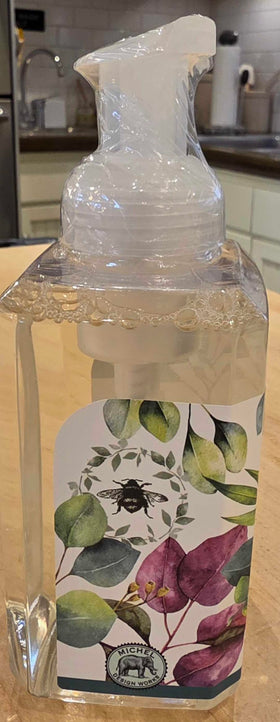Michel Design Works dispenser styled on bathroom counter adding decorative, fresh-scented ambiance