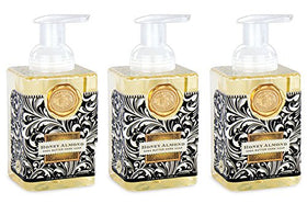 Michel Design Works front view dispenser showing elegant square bottle and honey almond scent benefit