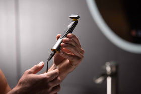 MicroTouch SOLO titanium blade close-up showing sharp edge for precise trimming
