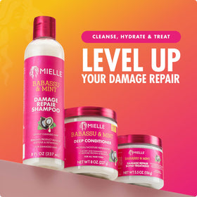 Mielle Organics being applied to damp textured hair for moisture