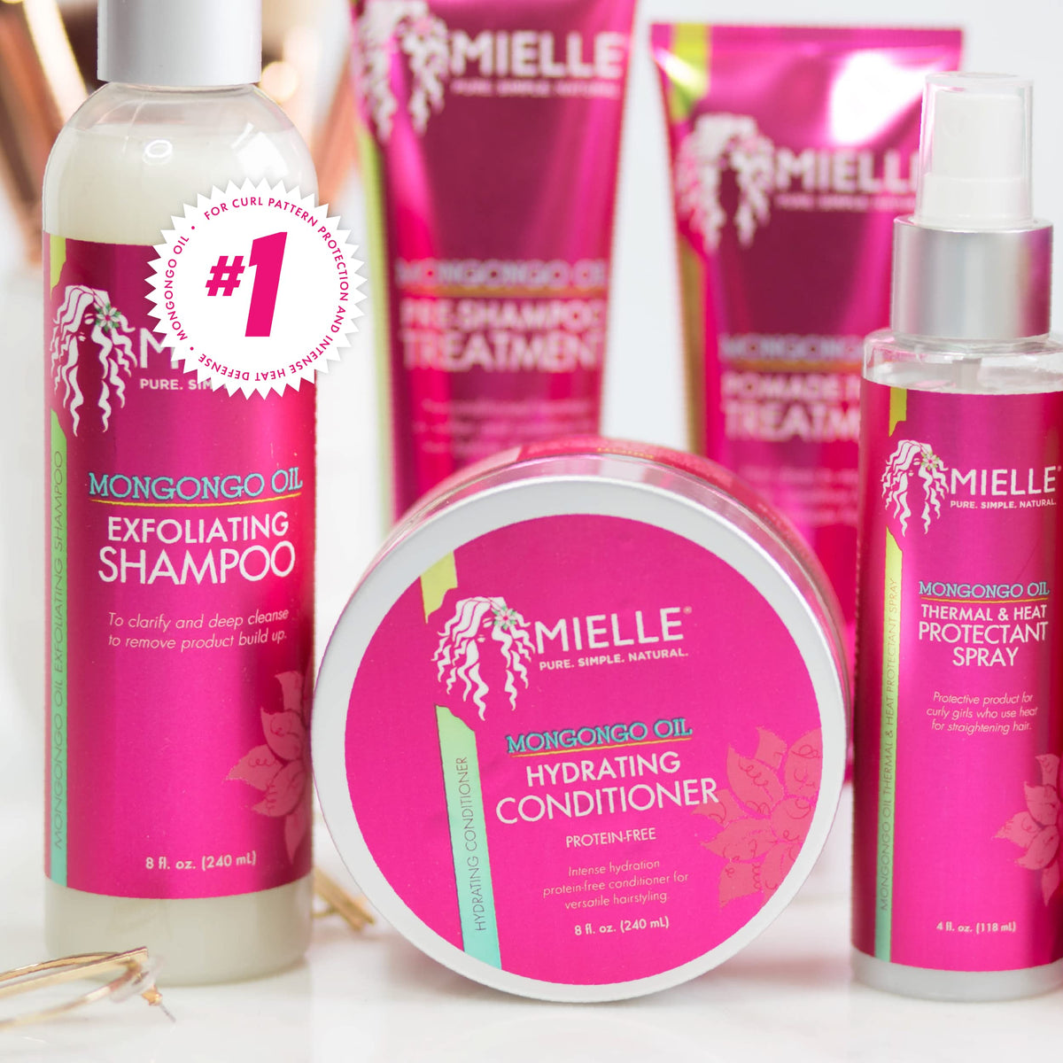 Mielle Organics bottle staged on bathroom shelf for everyday use