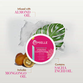 Mielle Organics pump dispensing creamy conditioner for smooth application