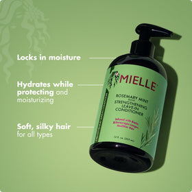 Mielle Organics being applied to curly hair for smoother detangling