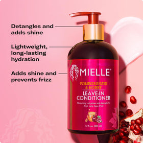 Applying Mielle Organics on damp curls to reduce frizz and smooth hair