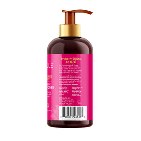 Mielle Organics bottle on bathroom shelf showing everyday curl care routine
