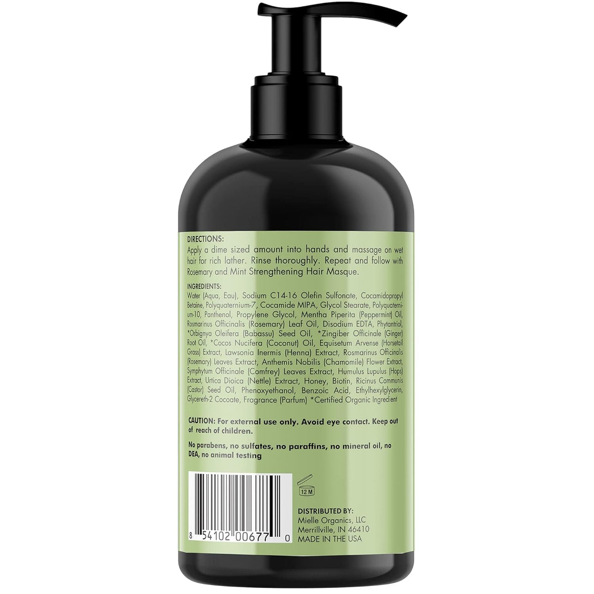 Woman using Mielle Organics shampoo in shower illustrating hydrated results