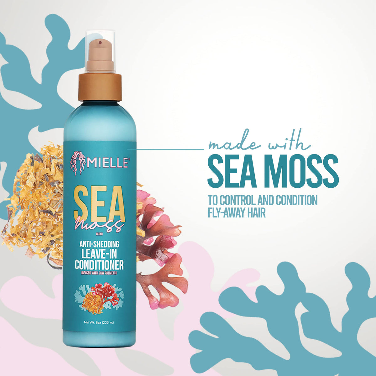 Mielle Organics 8 oz bottle in hand showing scale and travel-friendly size