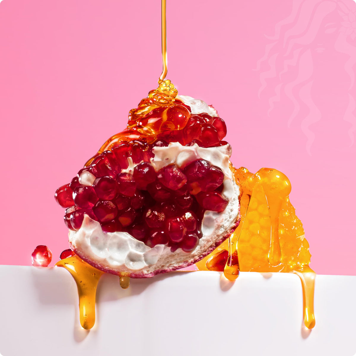 Mielle Organics ingredients label highlighting pomegranate and honey