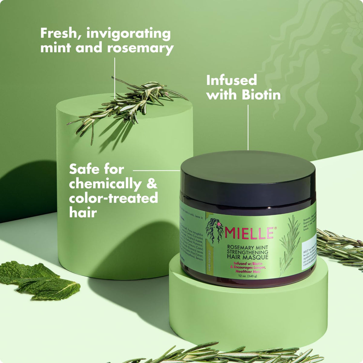 Mielle Organics ingredients display with coconut and rosemary for nourishment