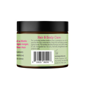 Mielle Organics jar styled on bathroom shelf suggesting daily use
