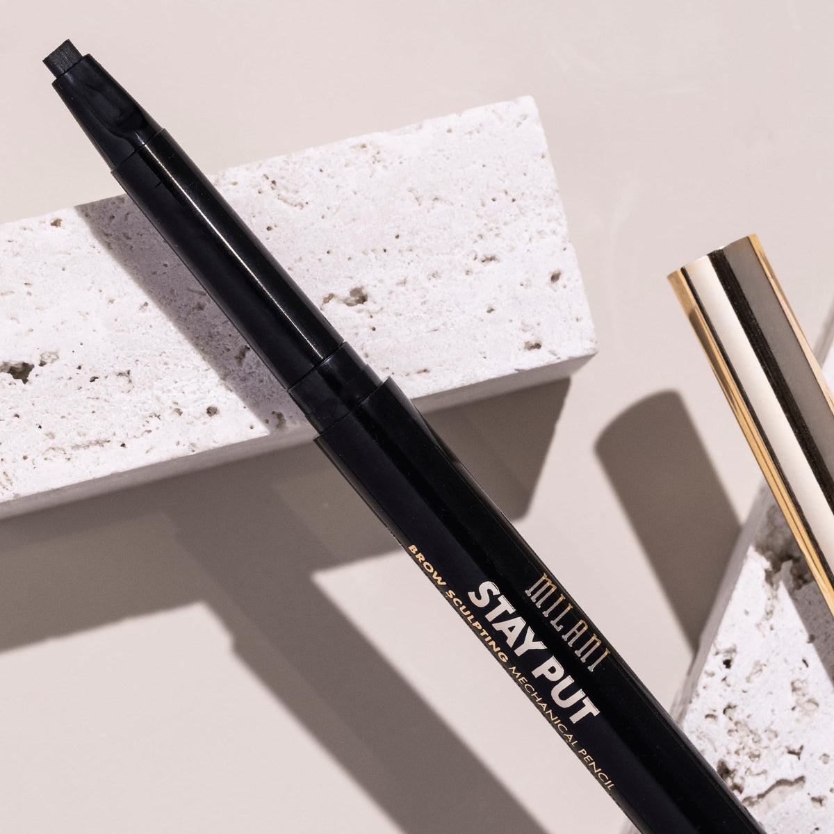 Milani lifestyle application on model for polished everyday brows benefit