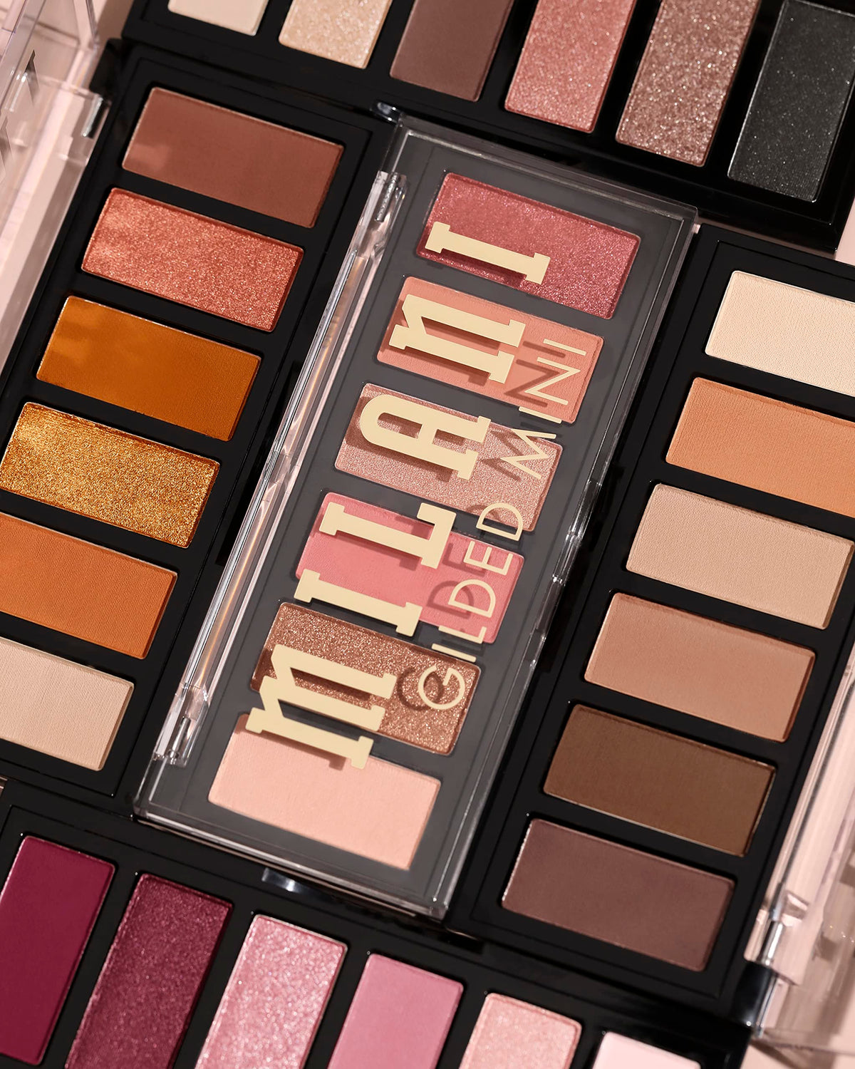 Milani palette beside coin showing compact size and space-saving benefit