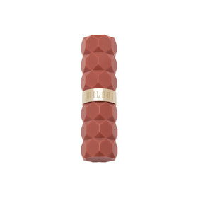 Milani lipstick flatlay with accessories showing everyday style and versatile color benefit