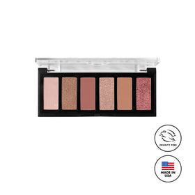 Milani arranged with makeup bag and brushes showing versatile daily styling