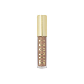 Milani model wearing gloss in lifestyle setting showing wearable daily shine