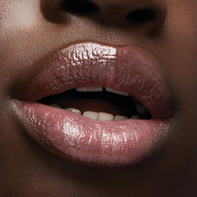 Milani label and ingredients panel emphasizing hyaluronic and peptide actives
