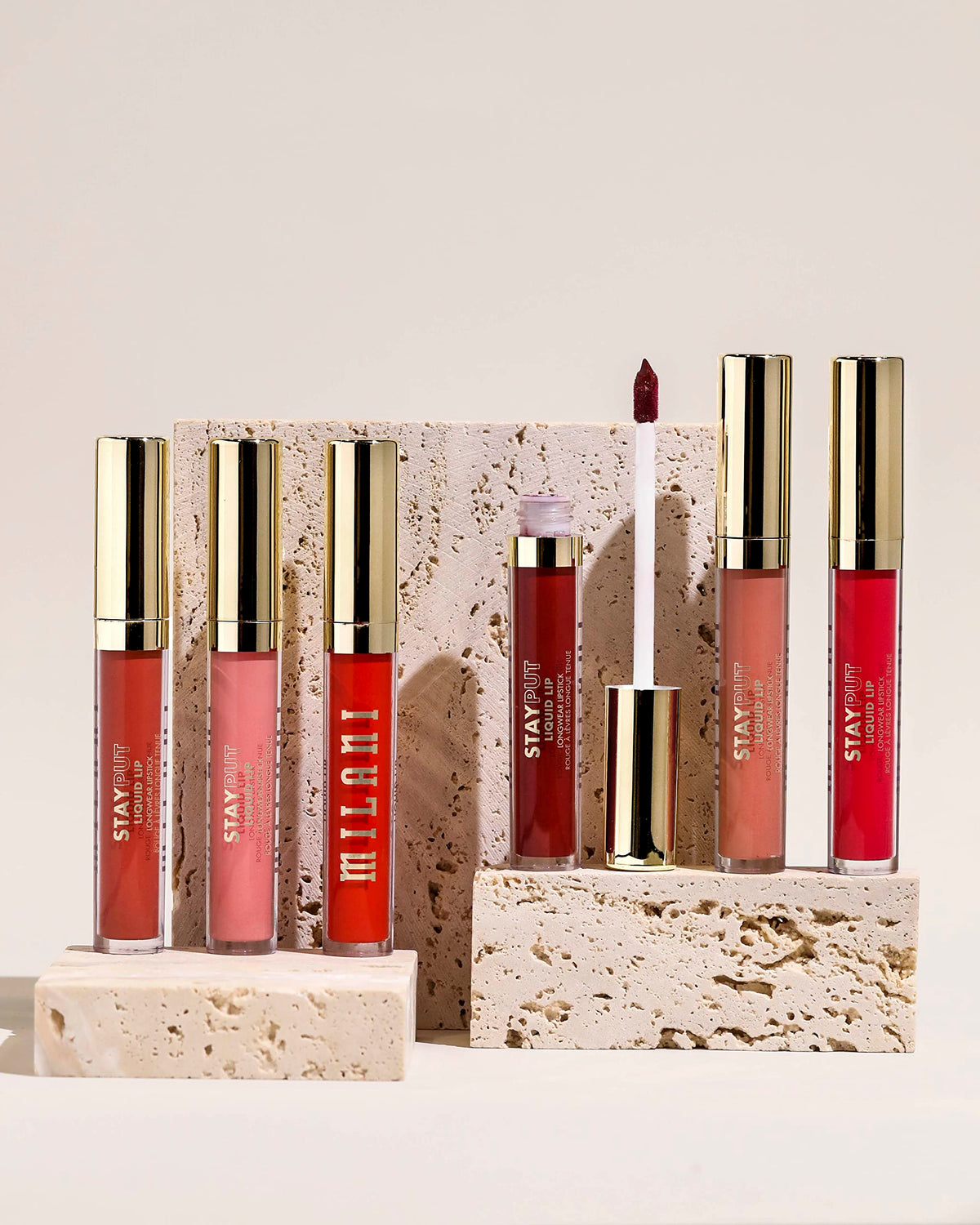 Milani worn on model lips showcasing true Red Flag color and confident wear