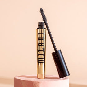 Milani mascara next to ruler for size comparison and travel-friendly convenience