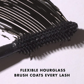 Milani tube open showing creamy black texture and smooth application benefit