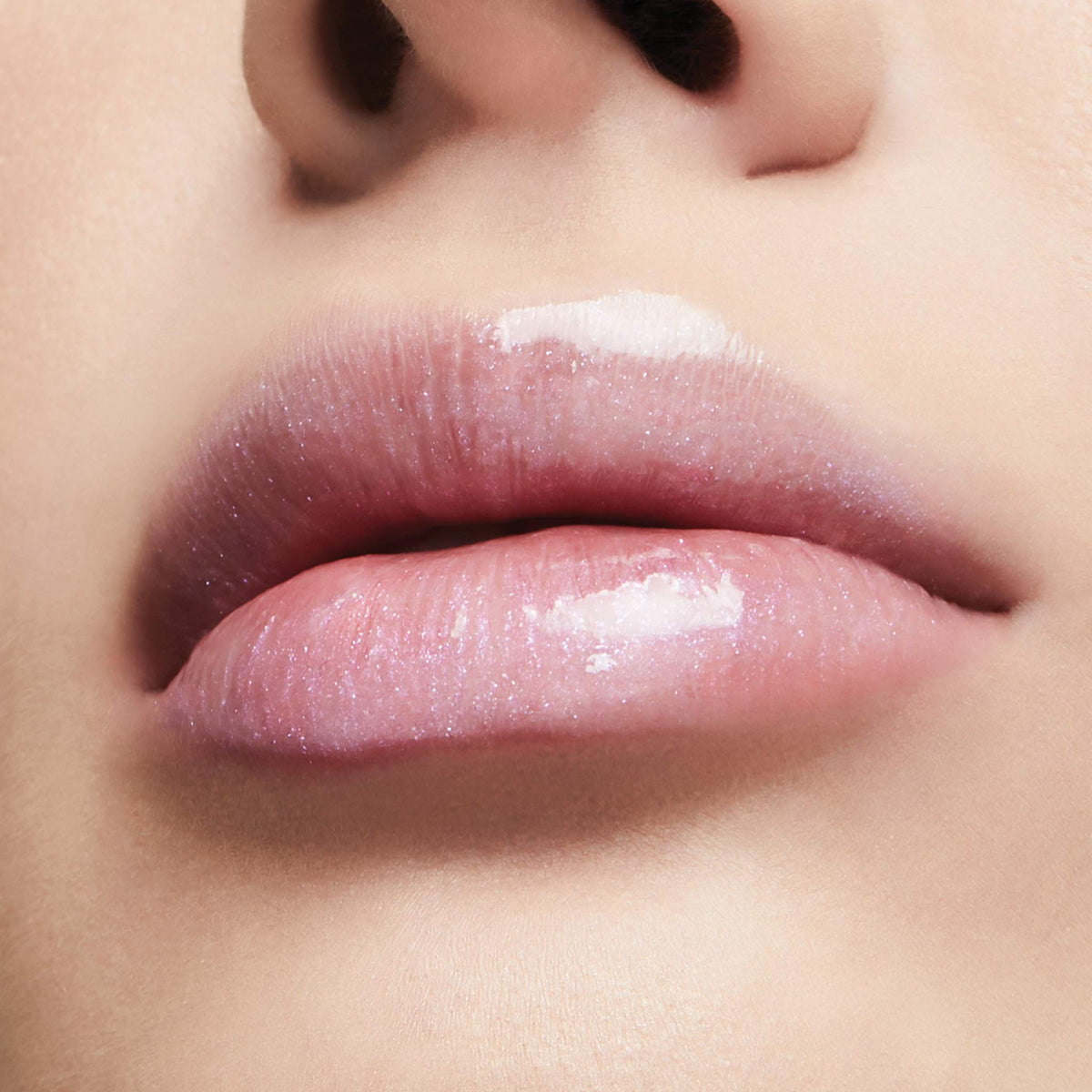 Milani open tube angled detail highlighting creamy gloss for comfortable wear