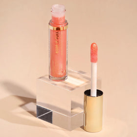 Milani product flatlay with other makeup showing layering and styling ideas