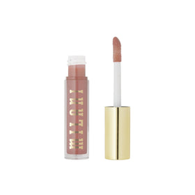 Milani product on vanity with makeup items showing everyday wearable styling