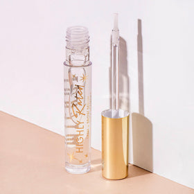 Milani tube next to ruler showing compact size for travel-friendly use