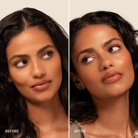 Milani spray being applied over finished makeup to refresh and protect